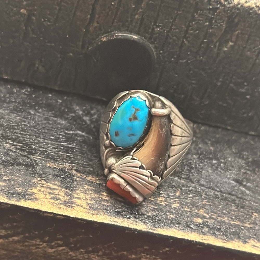 Beautiful bearclaw, turquoise, and coral ring. purchased in New Mexico.